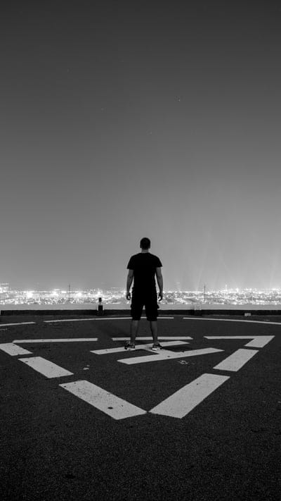 boystandingonhelipad,helipad,boyback,alone,citybg,night,dark,boy,attitude