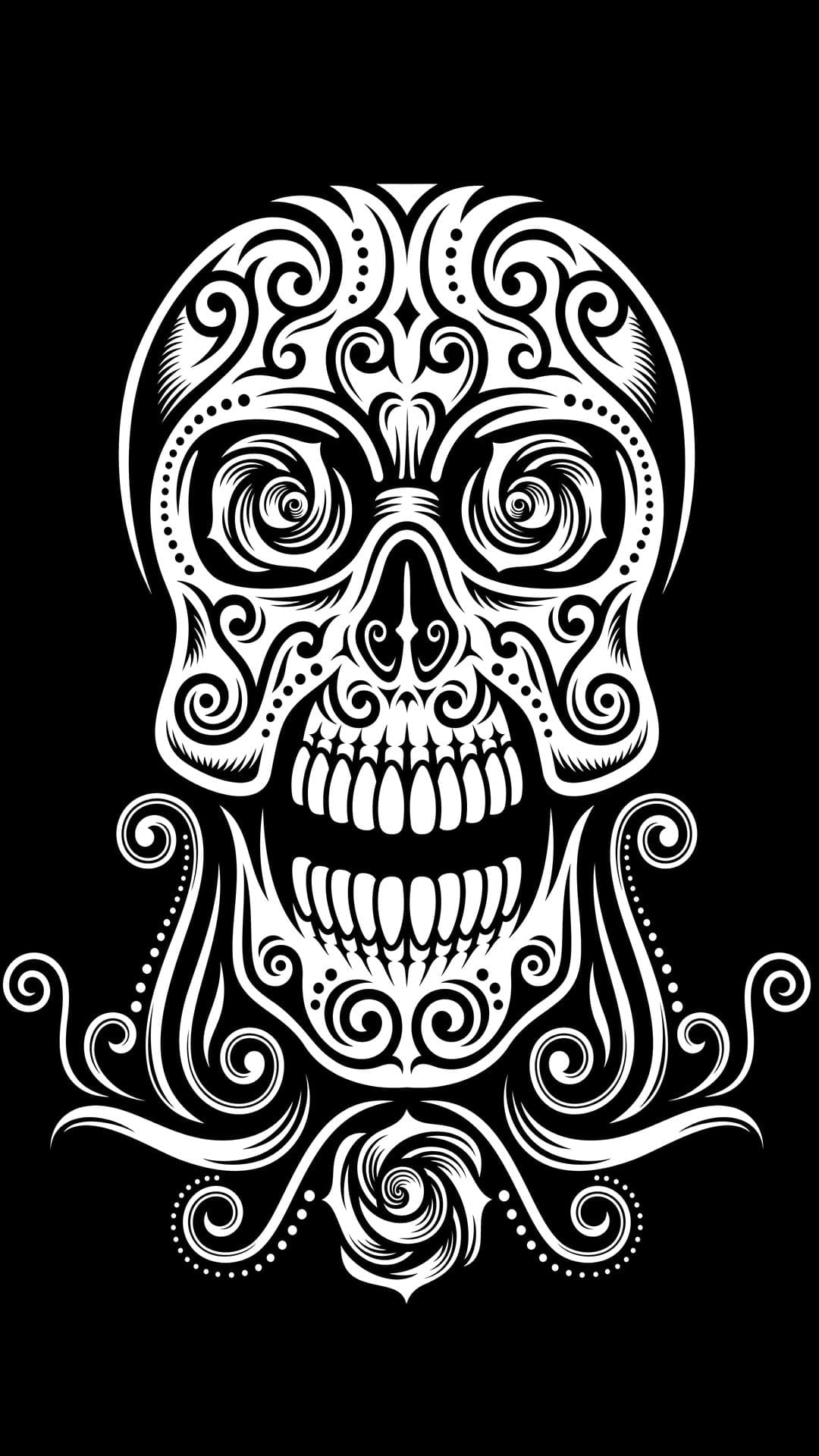 White skull with symmetrical floral carvings and swirling vine patterns centered on a solid black background.