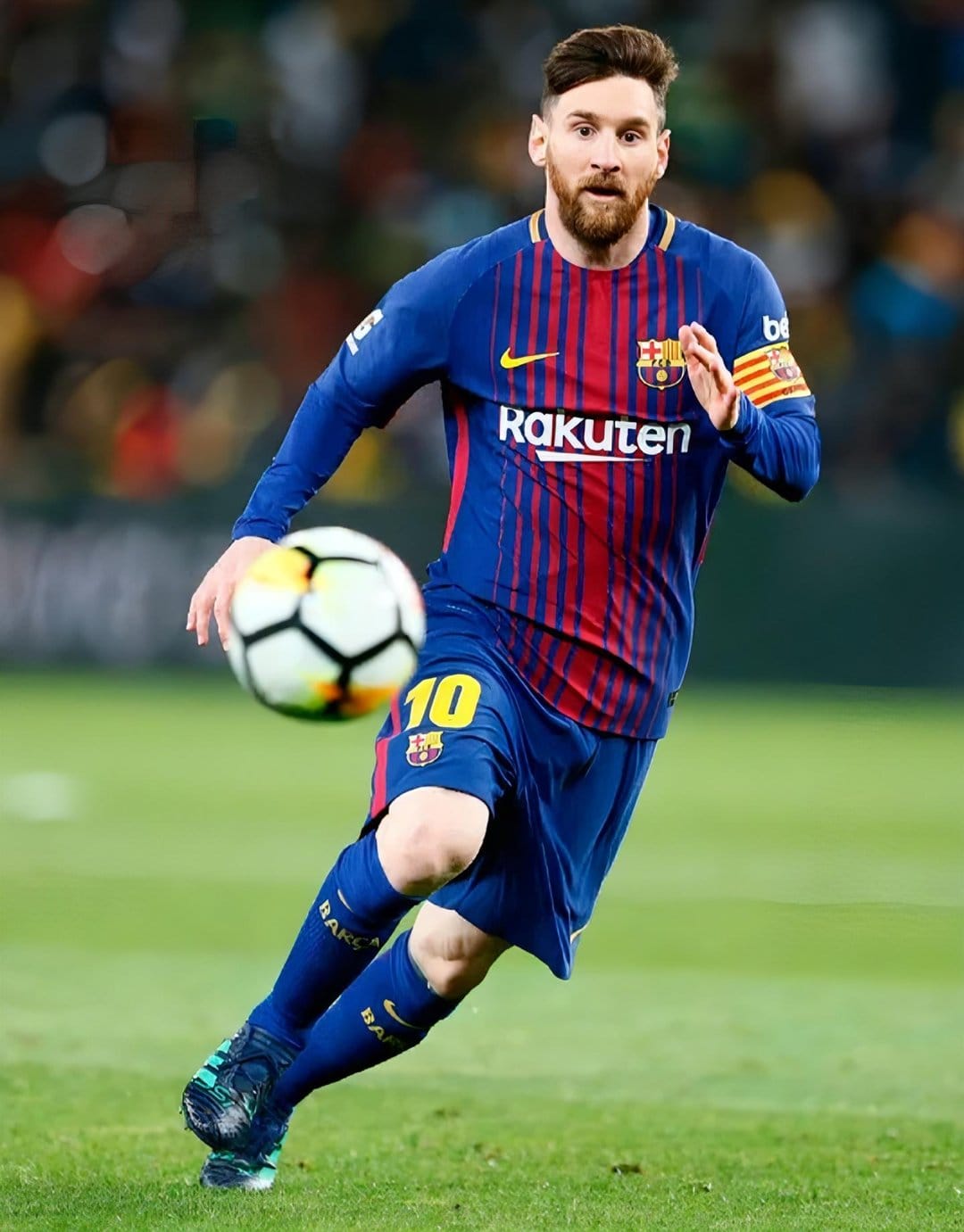 Lionel Messi dribbling a soccer ball on a grass field while wearing a striped blue and red Barcelona jersey.