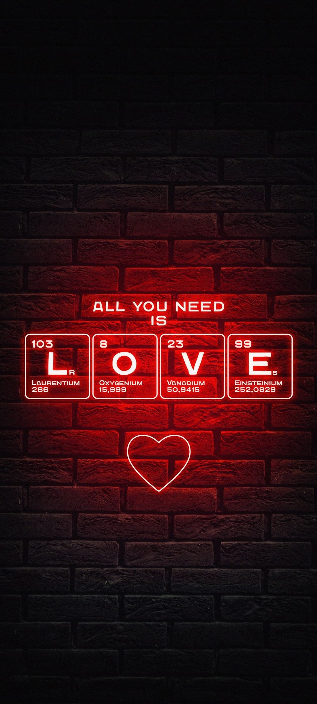 Red neon LOVE sign using periodic table symbols glows against a dark brick wall with a small heart icon below.
