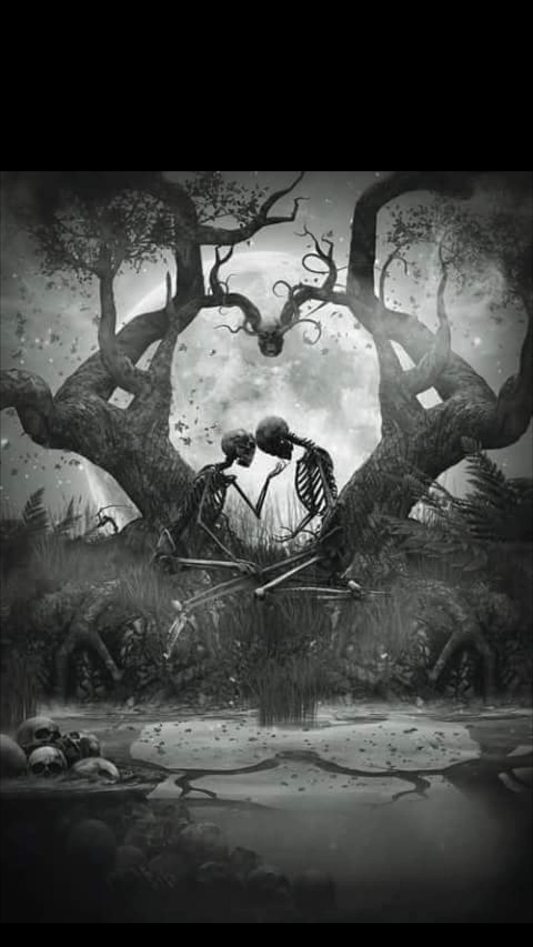 Two skeletons embrace beneath a heart-shaped tree with a large full moon and skulls in a misty dark landscape.