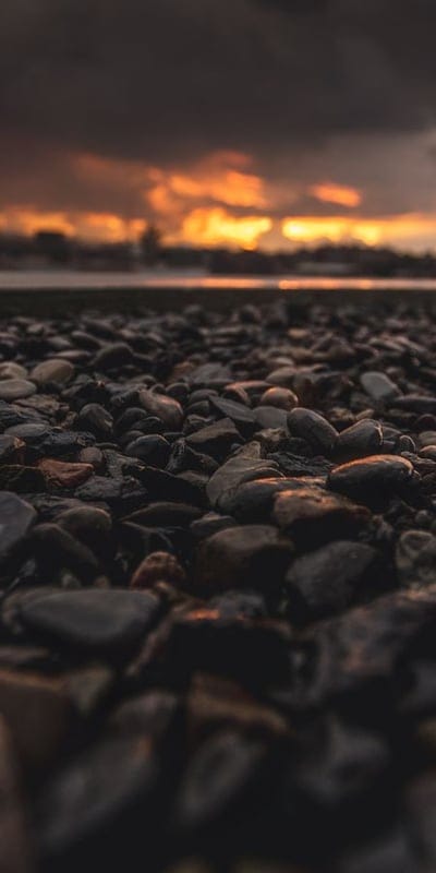 Pebbles, Beach, Sunset, Rocks, Shore, Stones, Dusk, Nature, Orange, Sky, Textured, Landscape, Foreground, Horizon, Coastal, Outdoors, Serene, Warmth, Peaceful, Earthy
