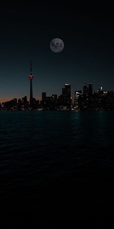 Cityscape, Moon, Night, Urban, Skyline, Reflection, Water, Metropolis, Tower, Illuminated, Dark, Serene, Lunar, Architecture, Modern, Scenic, Tranquil, City, Evening, Landscape