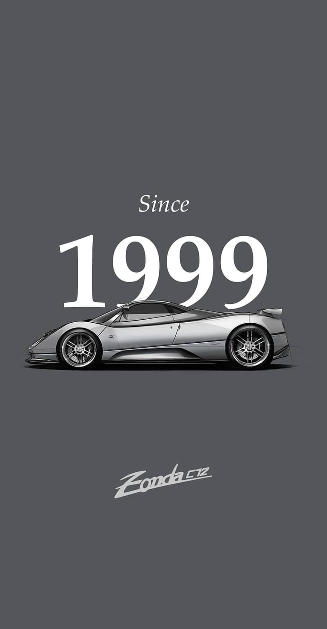 Pagani Zonda C12 with silver bodywork and quad exhausts captured in a vertical high-performance car profile.