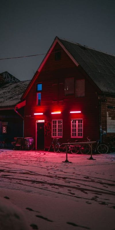 Urban, Night, Red light, Winter, Building, Snow, Illuminated, Bikes, Atmospheric, Cityscape, Cold, Glowing, Architecture, Unique, Evening, Crimson, Scene, Mysterious, Europe, Northern