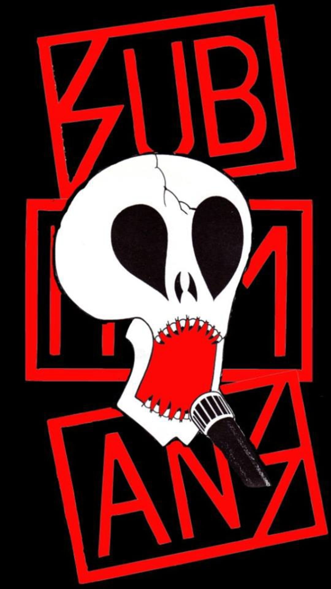 Stylized white skull with jagged red teeth holding a microphone against a black background with red text boxes.