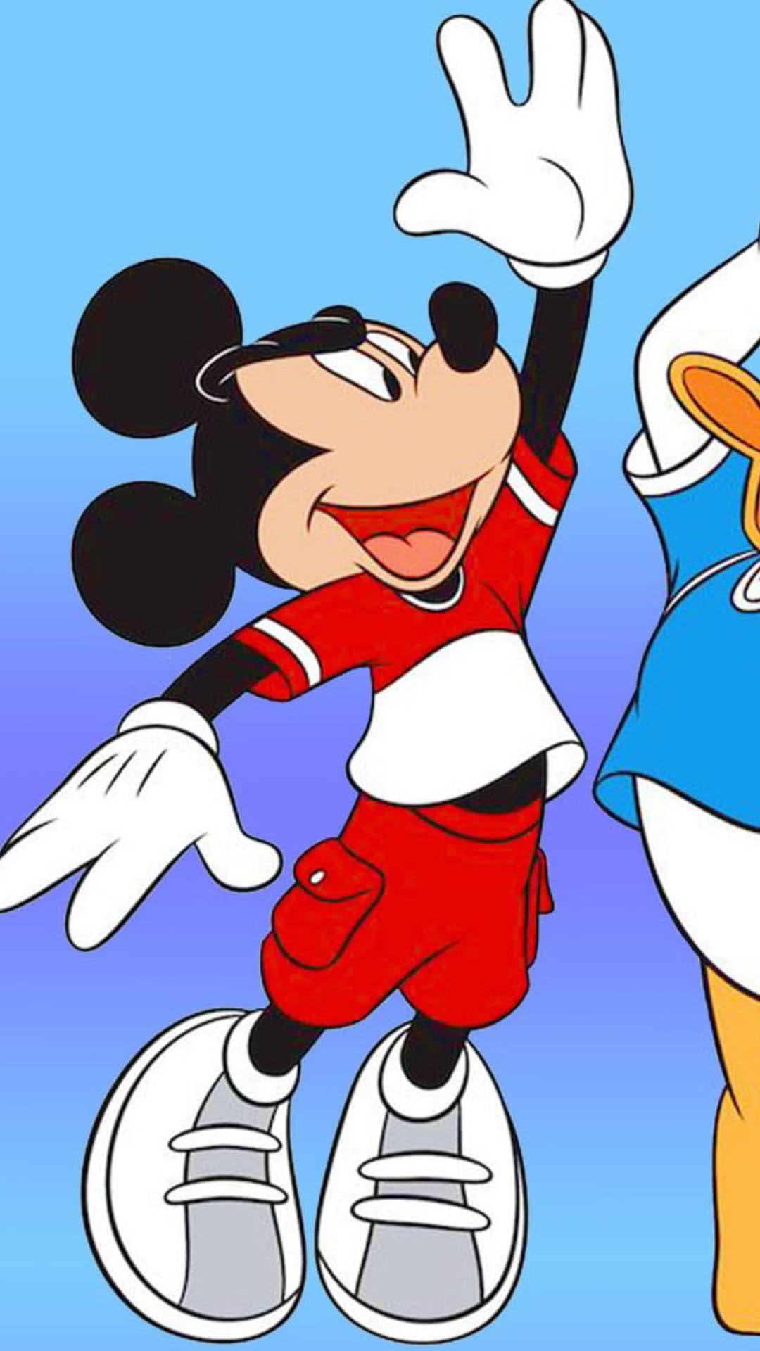 Mickey Mouse leaps mid-air with one arm raised while Donald Duck stands nearby against a solid blue backdrop.