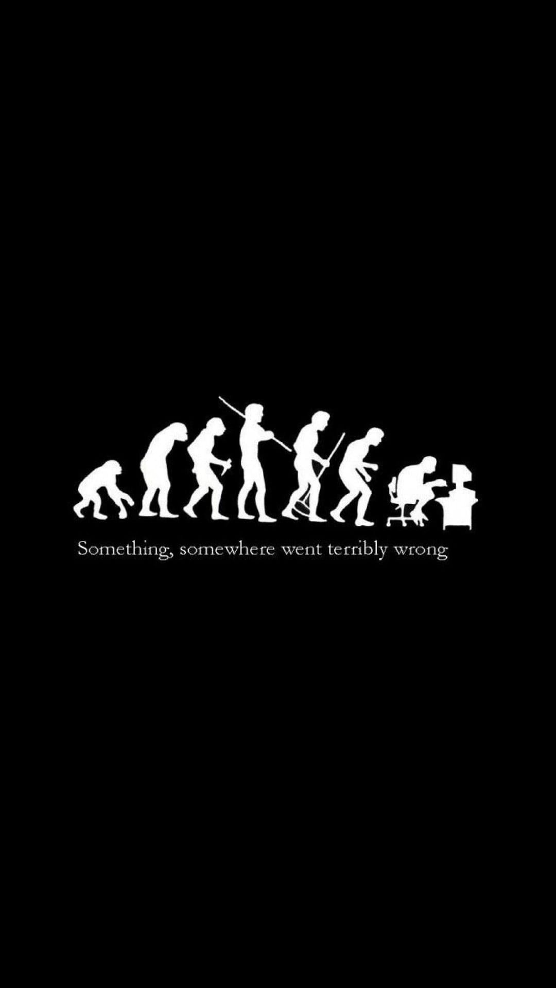 Evolution silhouettes of apes and humans leading to a hunched computer user with text on a black background.