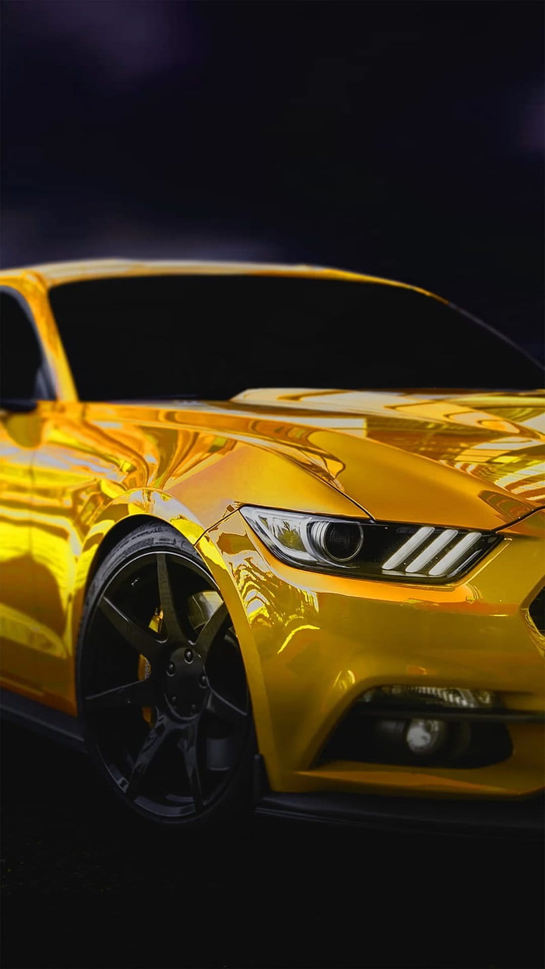 Golden chrome Ford Mustang featuring a muscular hood and sleek headlights in a front-facing perspective.