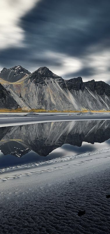 Mountains, reflections, water, nature, landscape, rugged, serene, peaceful, tranquil, beautiful, outdoor, clouds, sky, coastal, black sand, dramatic, majestic, cold, travel, peaceful scene