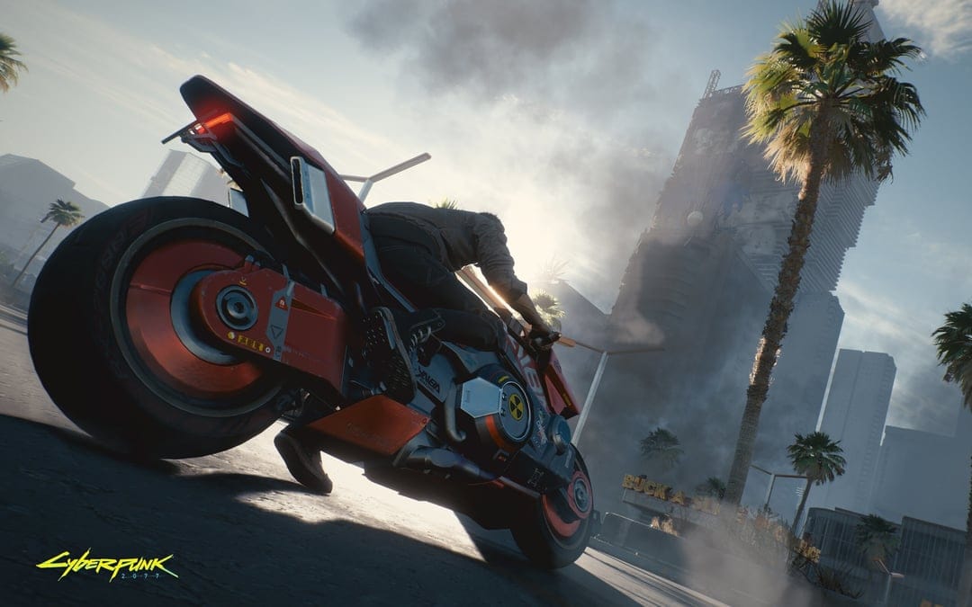 Red futuristic motorcycle and rider speeding through a sunlit sci-fi city with skyscrapers and palm trees.