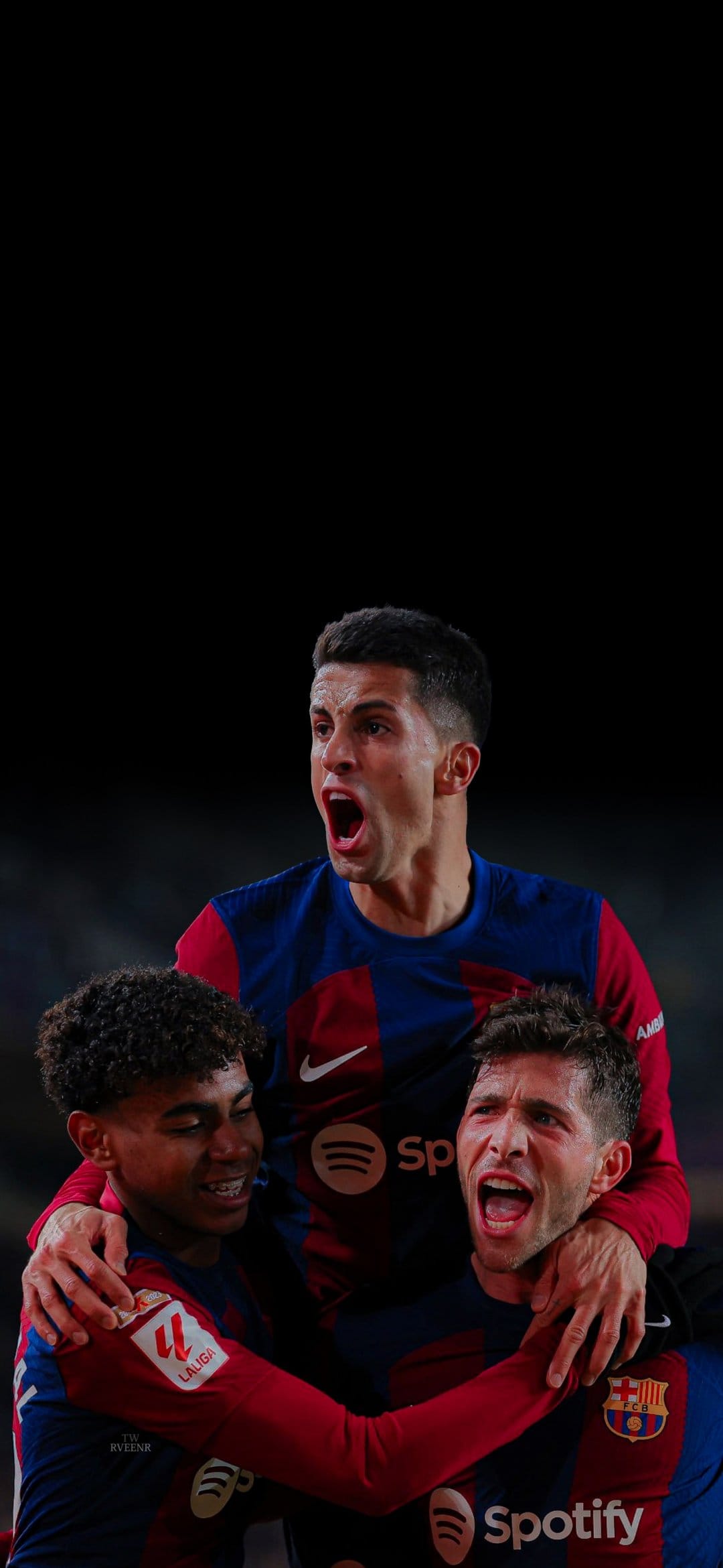 Barcelona players shout and embrace in a victory huddle wearing blue and red kits against a dark background.