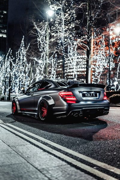 mercedes-benz c63 amg, mercedes, car, gray, street, lights, christmas, mobile wallpaper, android wallpaper, iPhone wallpaper, phone wallpaper