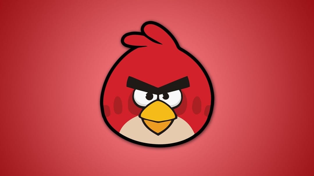 Angry Birds Red character centered on a red radial gradient background with thick black outlines and a yellow beak.