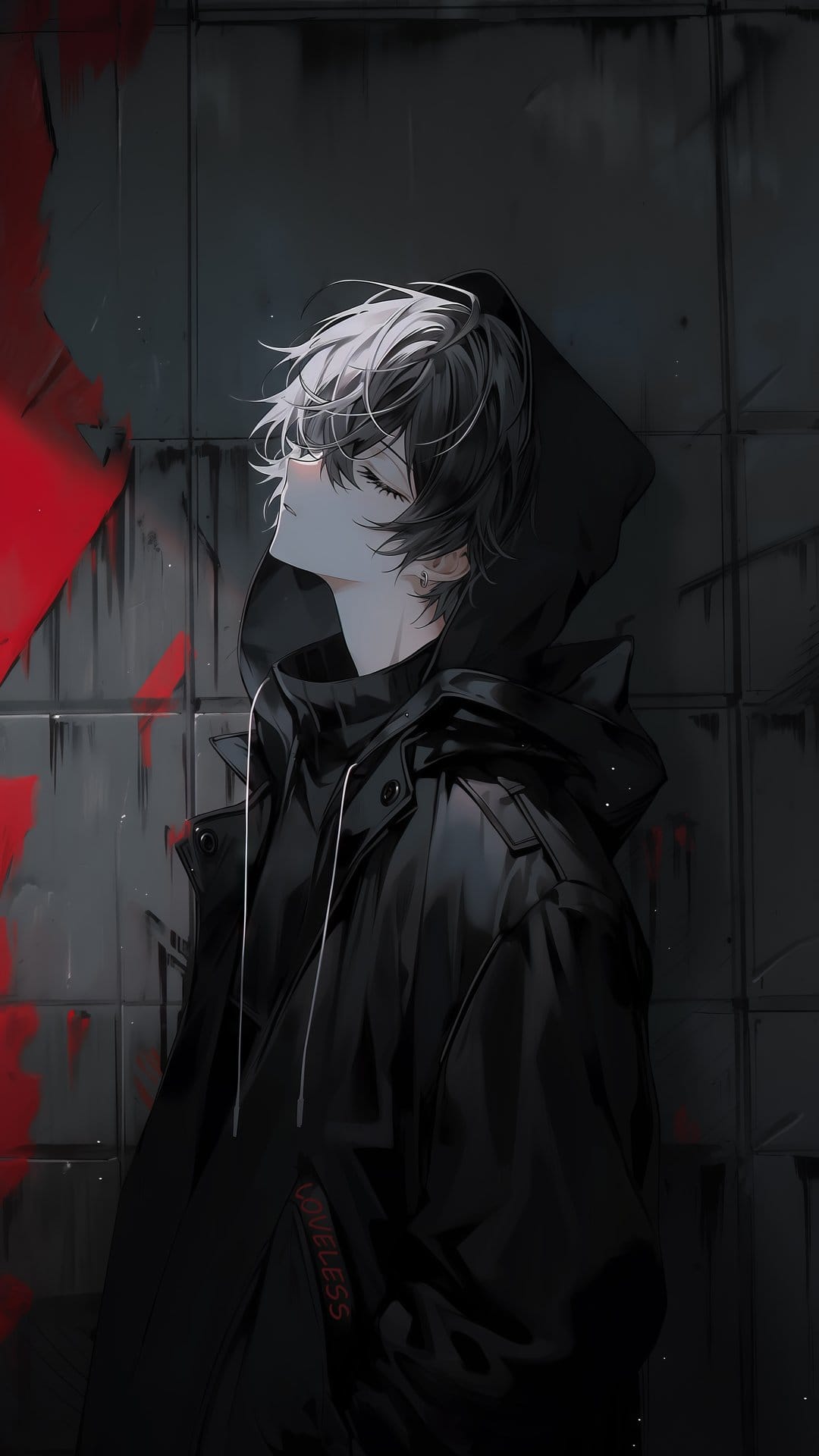 Young man with messy hair and closed eyes leans against a textured wall covered in red paint splatters.