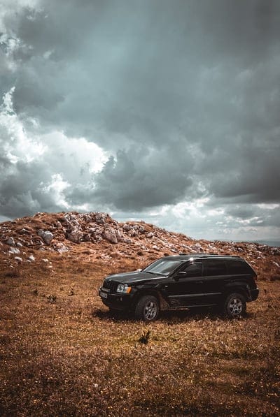 car, suv, side view, stones, sky, mobile wallpaper, android wallpaper, iPhone wallpaper, phone wallpaper
