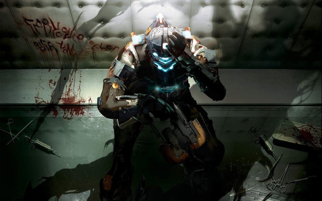 Isaac Clarke in sci-fi armor crouches in a padded room with blood symbols and medical tools on the floor.