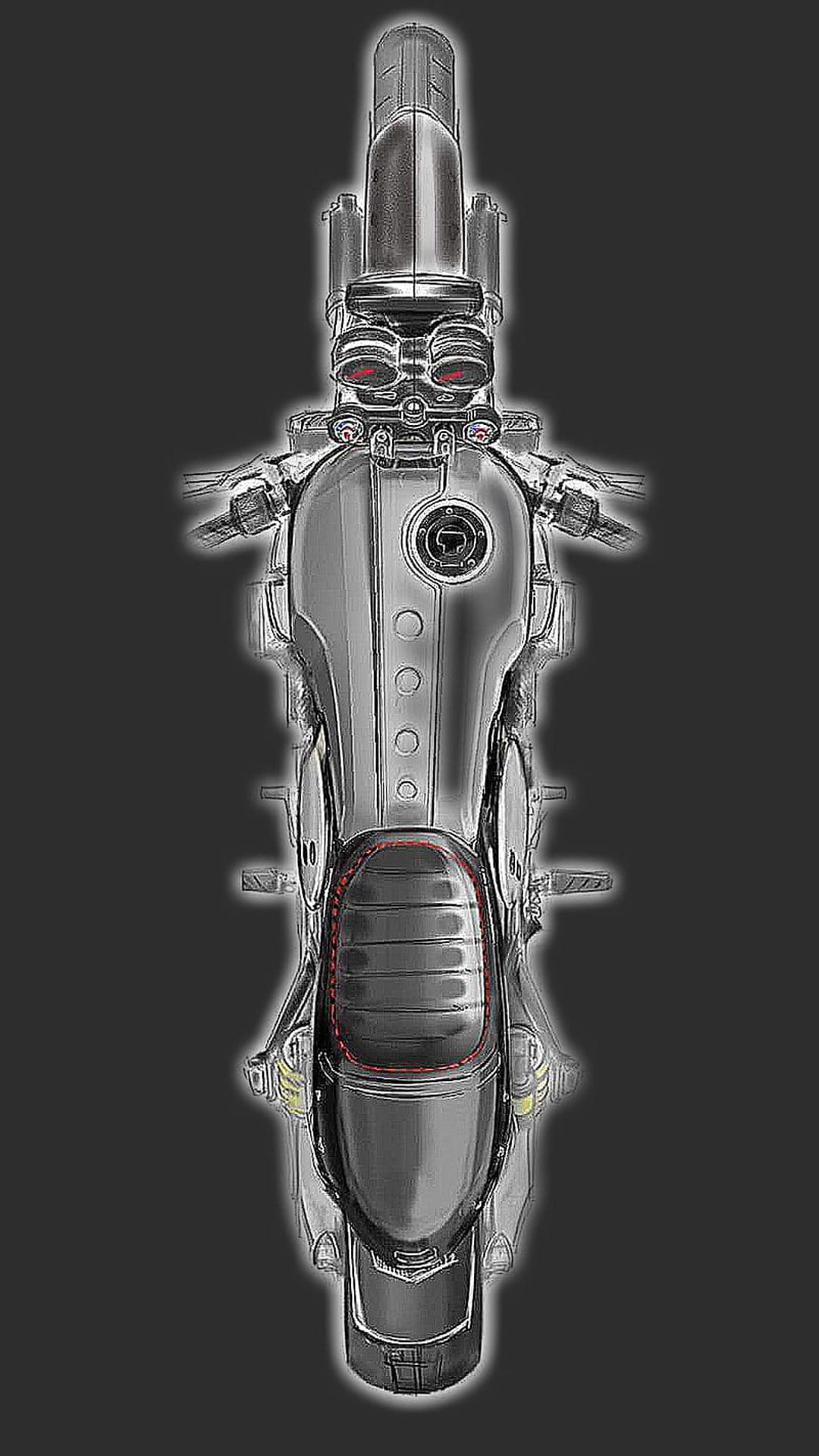 Chrome motorcycle with an elongated fuel tank and red trim viewed from an overhead perspective on a gray background.