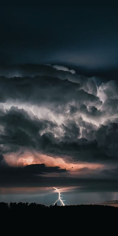 Lightning, Thunderstorm, Dark clouds, Night storm, Weather phenomena, Dramatic, Sky, Electrical storm, Atmospheric, Horizon, Nature's power, Intense, Turbulent, Ominous, Natural light, Stormy sky, Landscape, Flash, Clouds, Powerful
