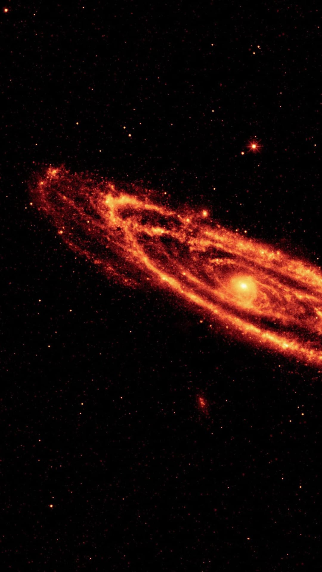 Crimson spiral galaxy with a glowing core and orange stardust arms against a dark black cosmic background.