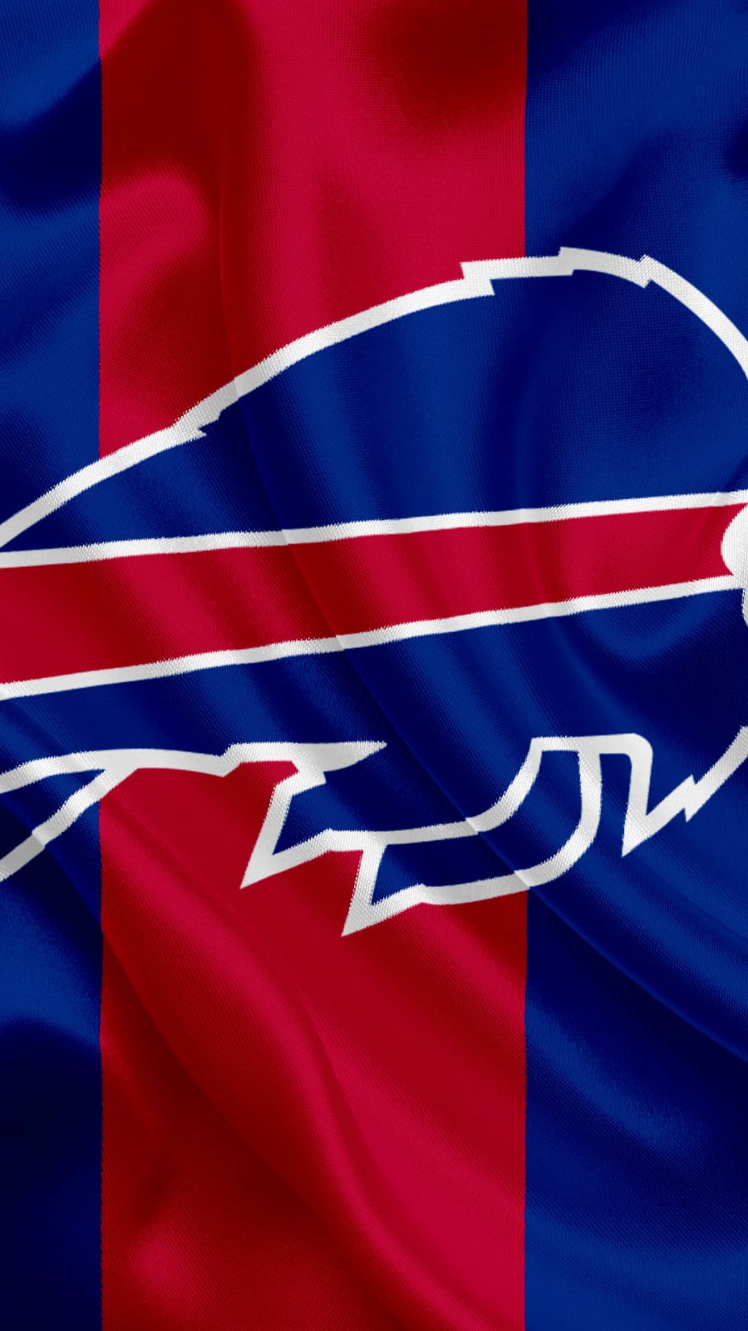 White buffalo logo on a rippled fabric flag with vertical red and blue stripes and visible textile textures.