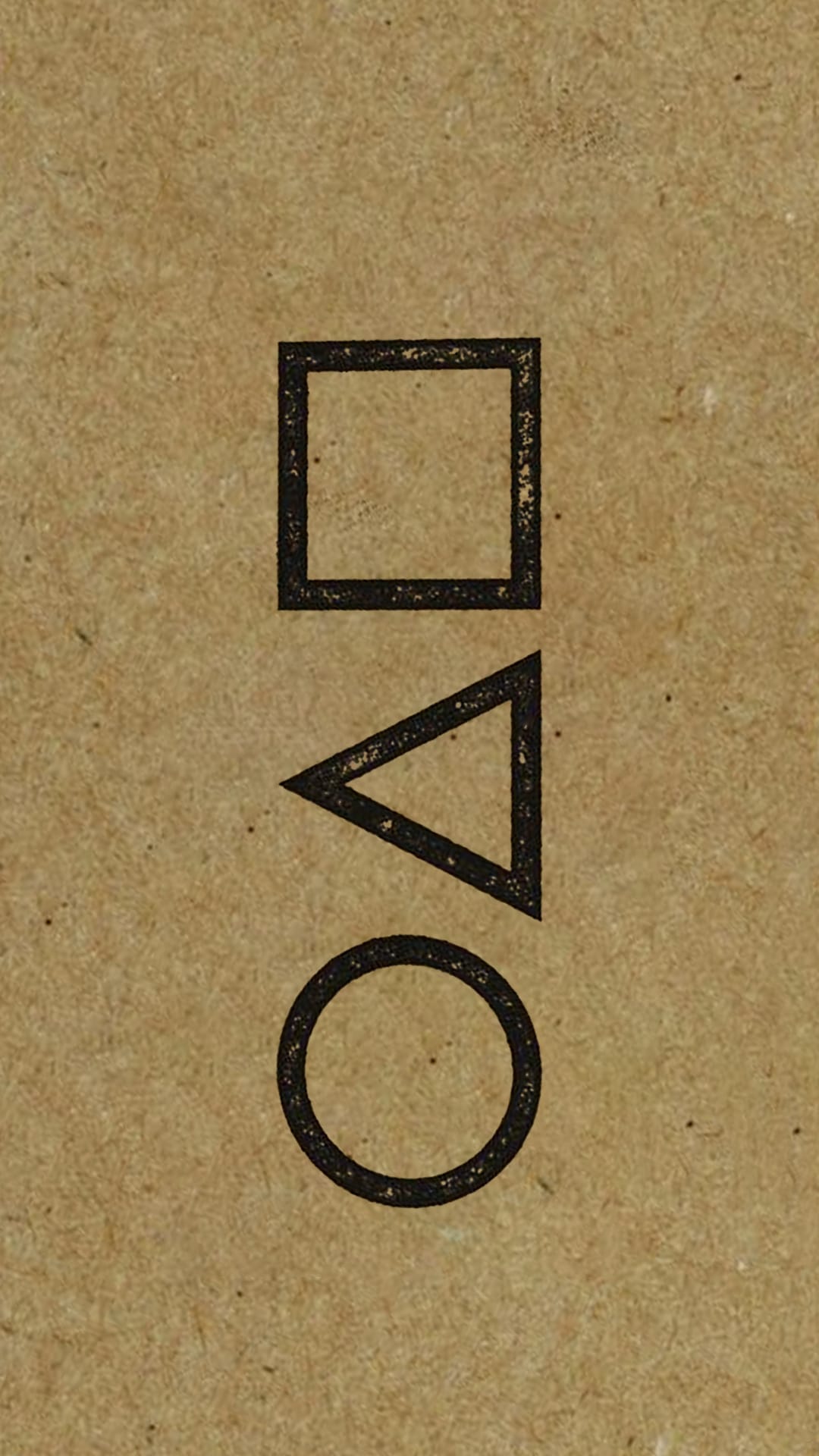 Circle, triangle, and square outlines in black ink appear centered on a rough, textured brown paper surface.