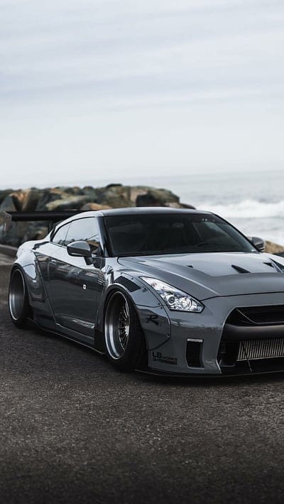 Nissan GTR, nissan, gtr, gris, sea, beach, car, supercar sports, mobile wallpaper, android wallpaper, iPhone wallpaper, phone wallpaper