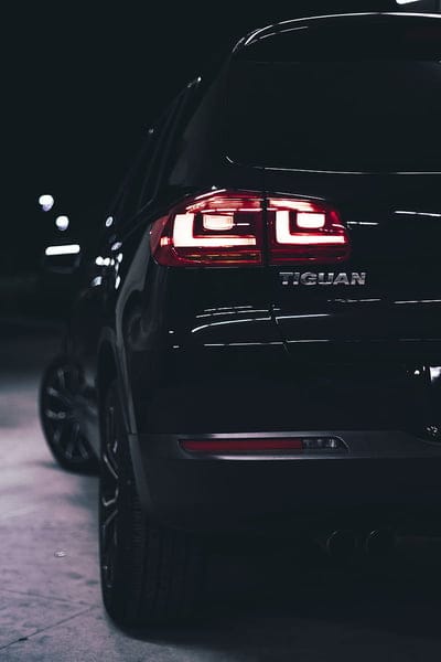 volkswagen tiguan, volkswagen, car, black, rear view, lights, backlight, mobile wallpaper, android wallpaper, iPhone wallpaper, phone wallpaper