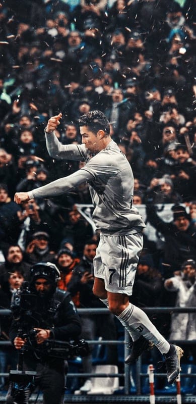 cristiano ronaldo,football player,football,jump,emotions,fans,cameraman