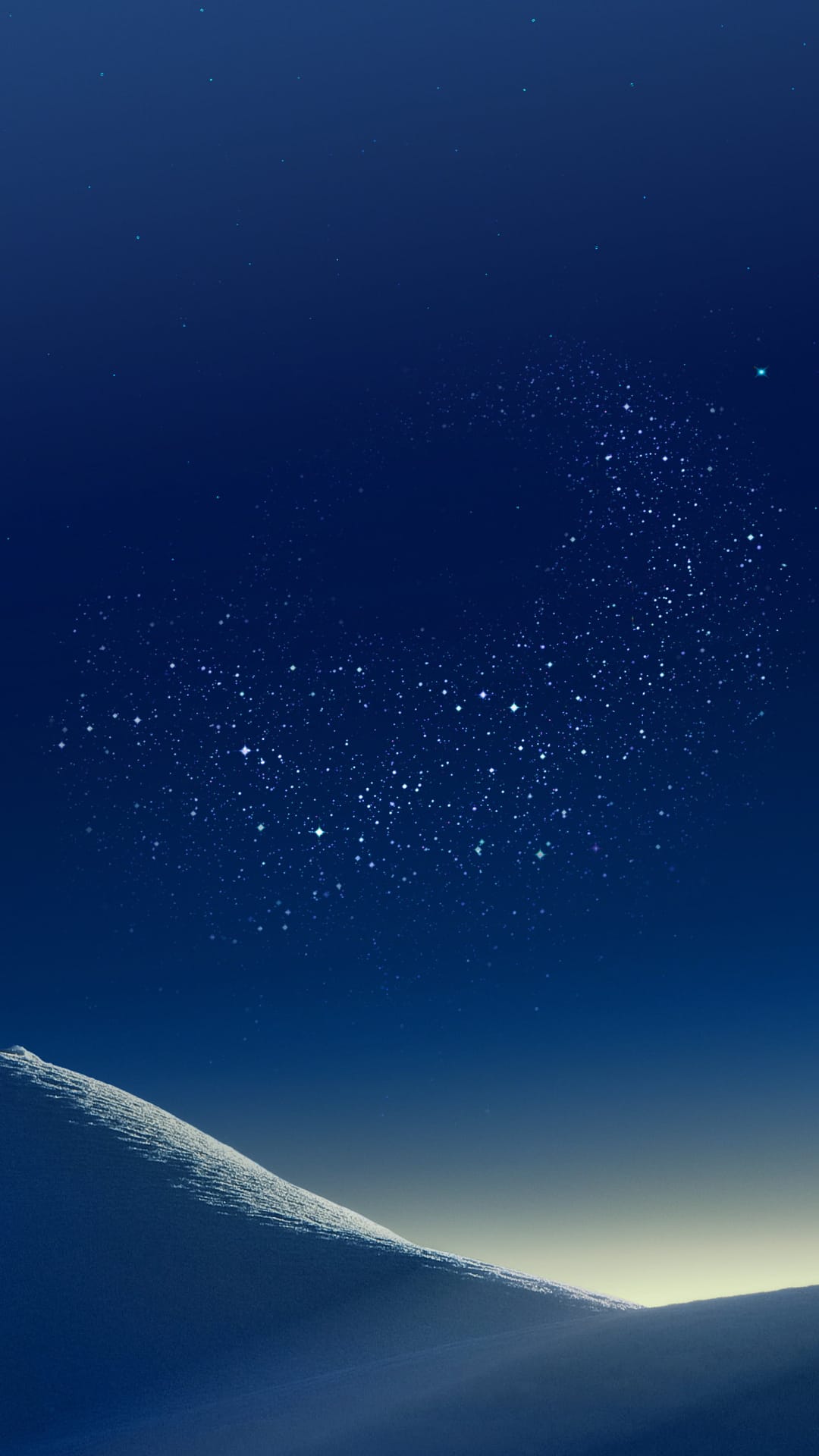 Snow-dusted sand dunes sit under a vibrant night sky filled with stars, distant galaxies, and deep blue nebulae.