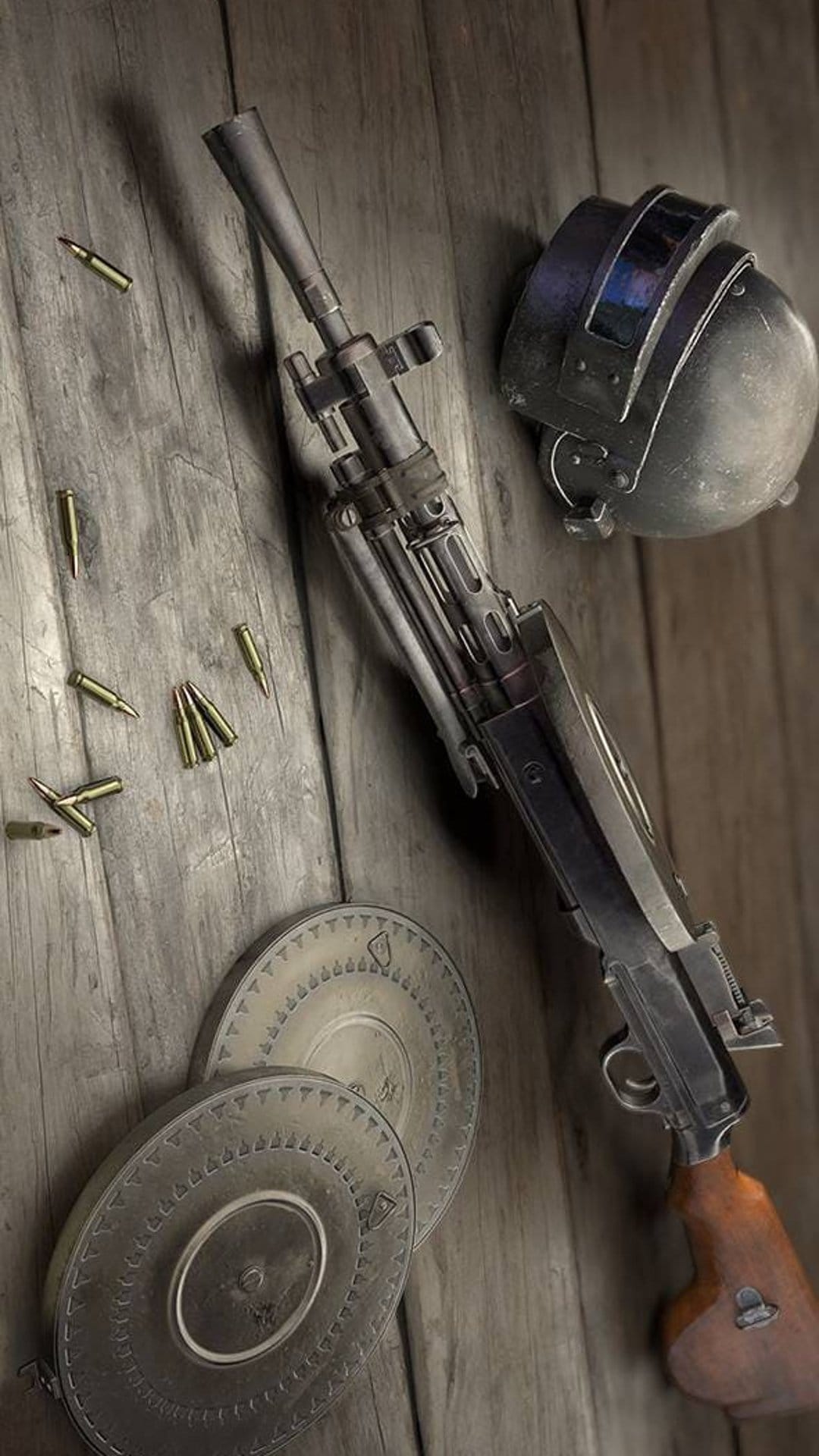 Vintage machine gun, military helmet, and brass ammunition rounds arranged on a rustic dark wooden surface.