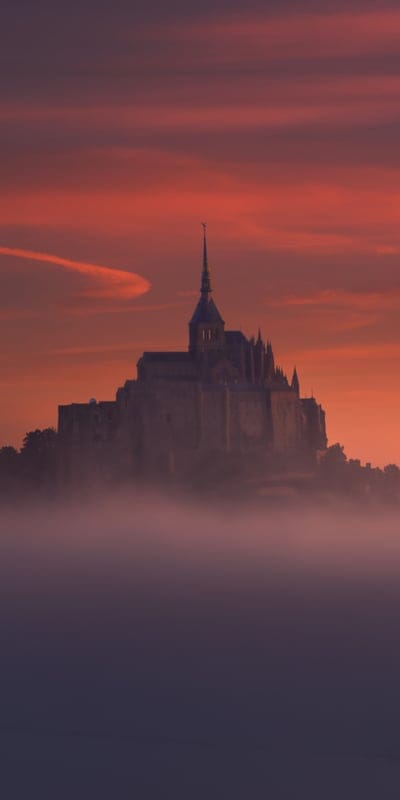 Mont Saint-Michel, France, historic, mist, dramatic, serene, outdoor, peaceful, beautiful, natural beauty, tranquil, picturesque, landmark, travel, architecture, fog, sunset, iconic, ancient, medieval, silhouette