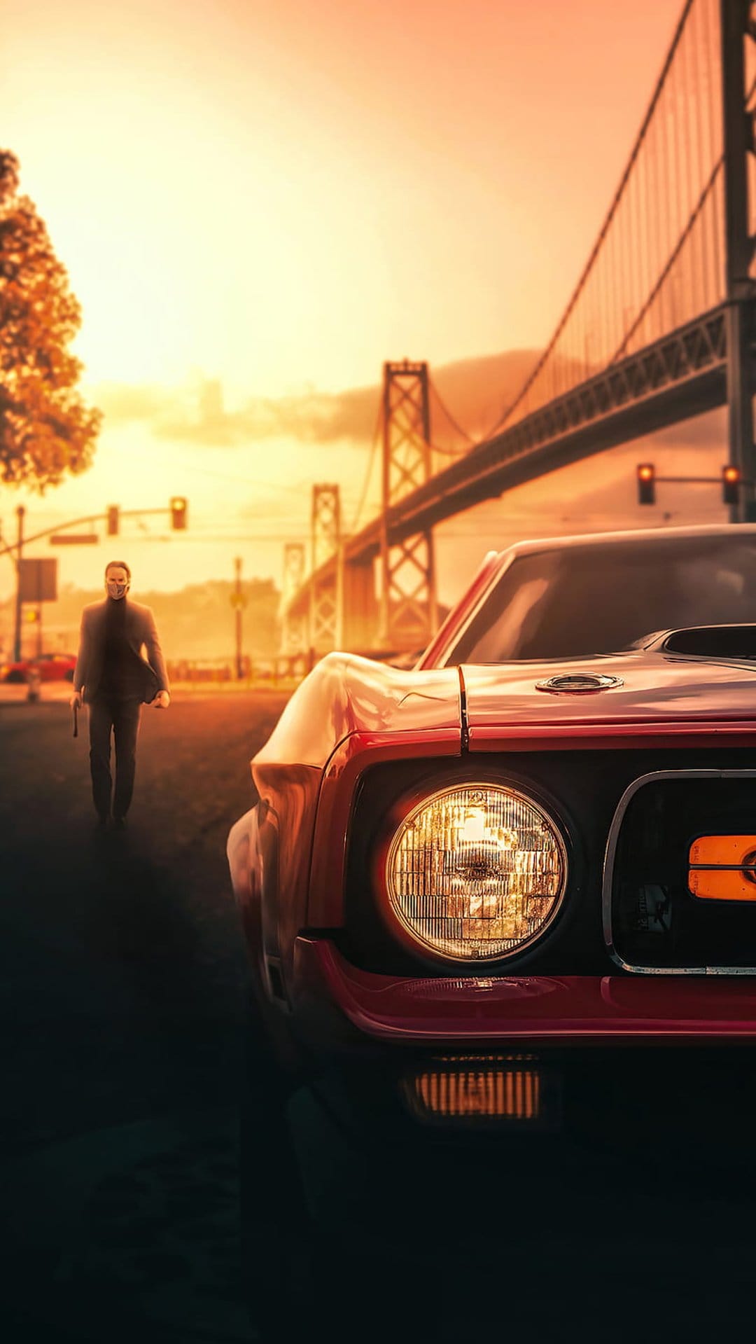 Man in a dark suit walking past a red vintage car on a road with a large suspension bridge during sunset.