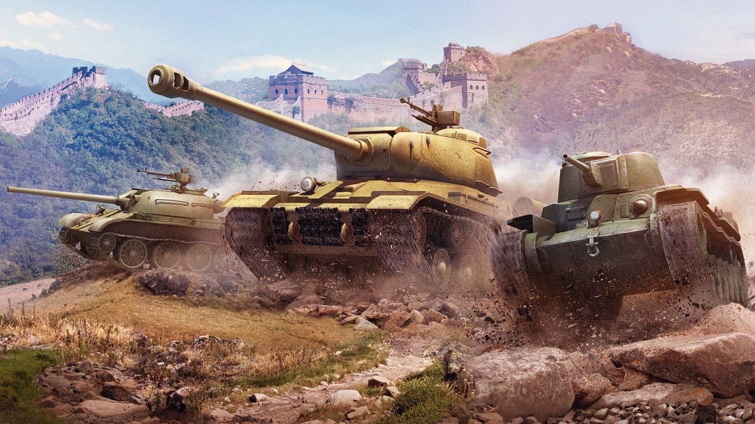 Three military tanks charging through a rocky mountain path in front of the stone towers of the Great Wall of China.