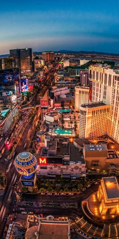 Las Vegas, Nevada, Strip, city, vibrant, urban, nightlife, illuminated, iconic, travel, USA, hotels, casinos, cityscape, entertainment, desert, lively, twilight, panoramic, lights, dramatic