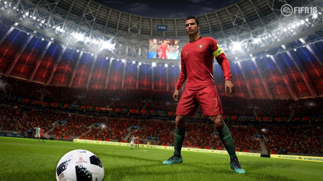 Cristiano Ronaldo in a red Portugal kit stands in a glowing stadium with a soccer ball in the foreground.