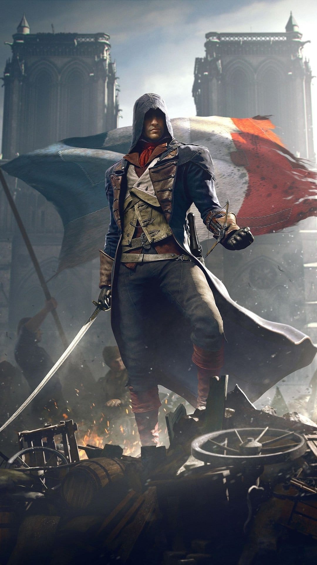 Arno Dorian in blue assassin robes stands on rubble holding a sword before a French flag and Notre-Dame cathedral.