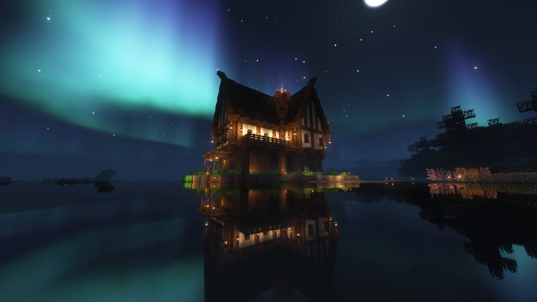 Minecraft aurora borealis illuminating a voxel mountain landscape with neon green reflections on blocky water.