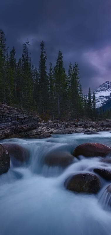 mountain river, nature, landscape, water flow, wilderness, serene, outdoor, peaceful, natural beauty, dramatic sky, forest, rocky, scenic, tranquil, long exposure, beautiful, pristine, majestic, cold, rugged