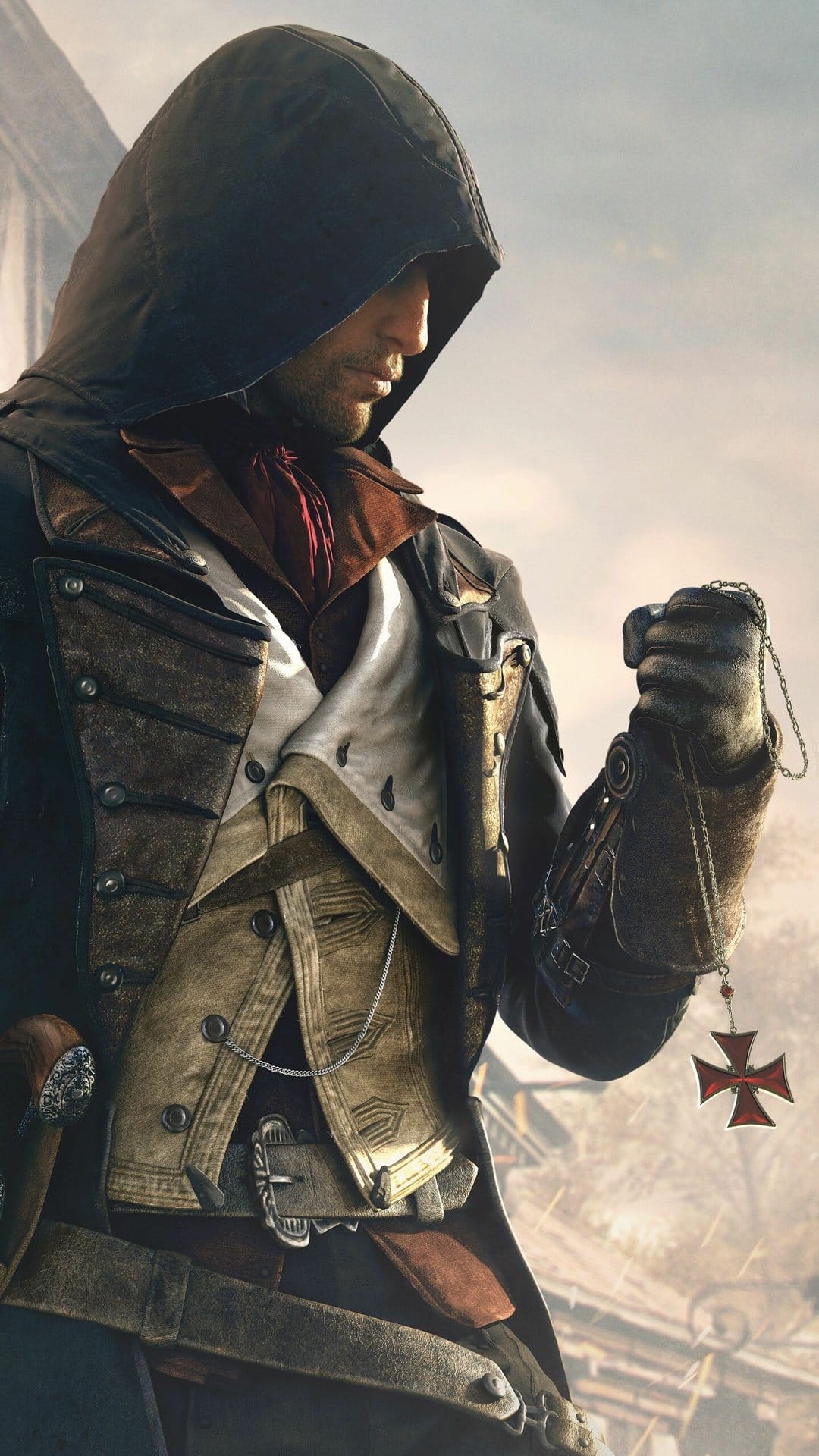 A hooded assassin in detailed navy and brown robes holds a red Templar cross pendant in his gloved hand.