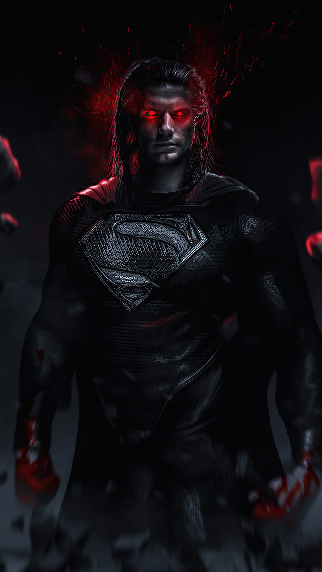 Superman in a black suit stares forward with glowing red eyes amidst floating debris and dark swirling smoke.