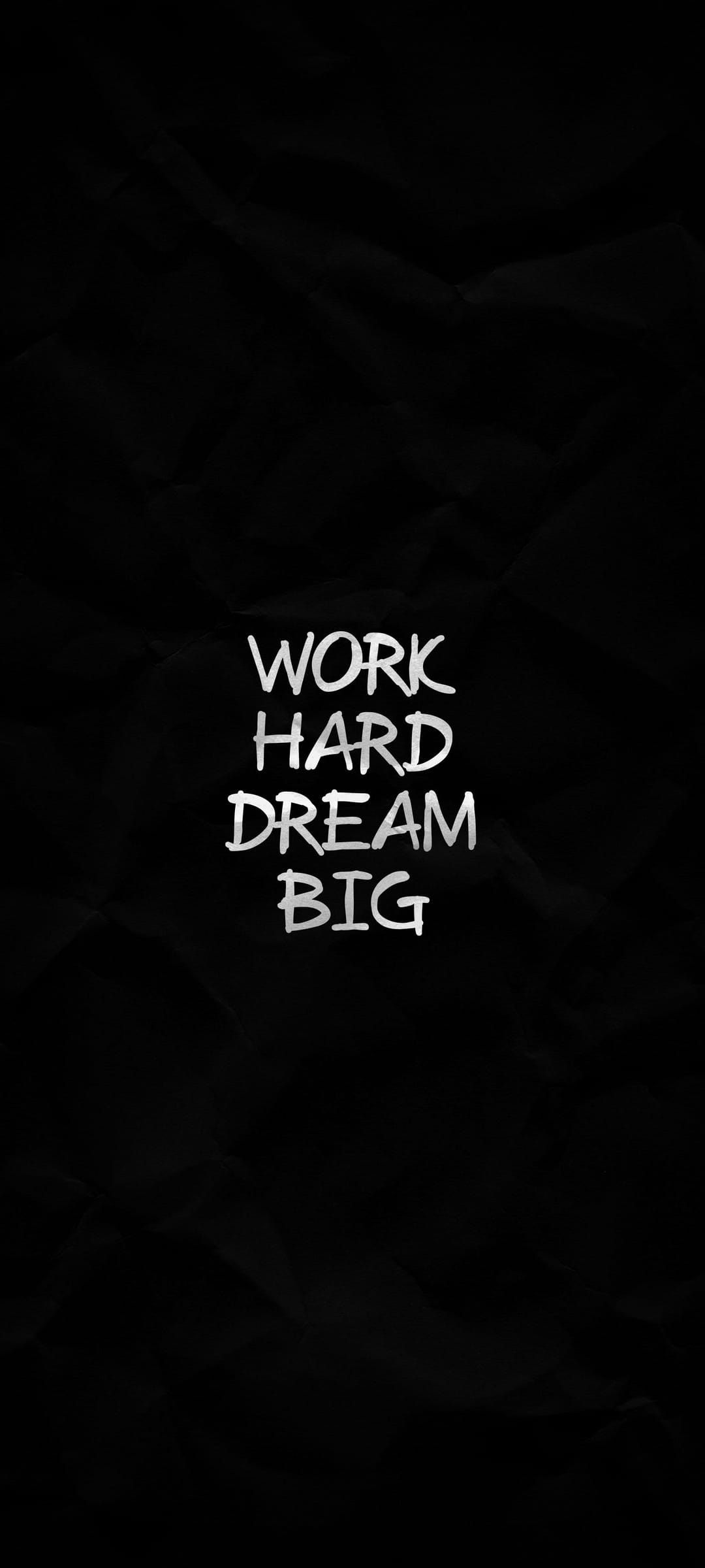 Distressed white block lettering reading Work Hard Dream Big centered on a solid matte black background.