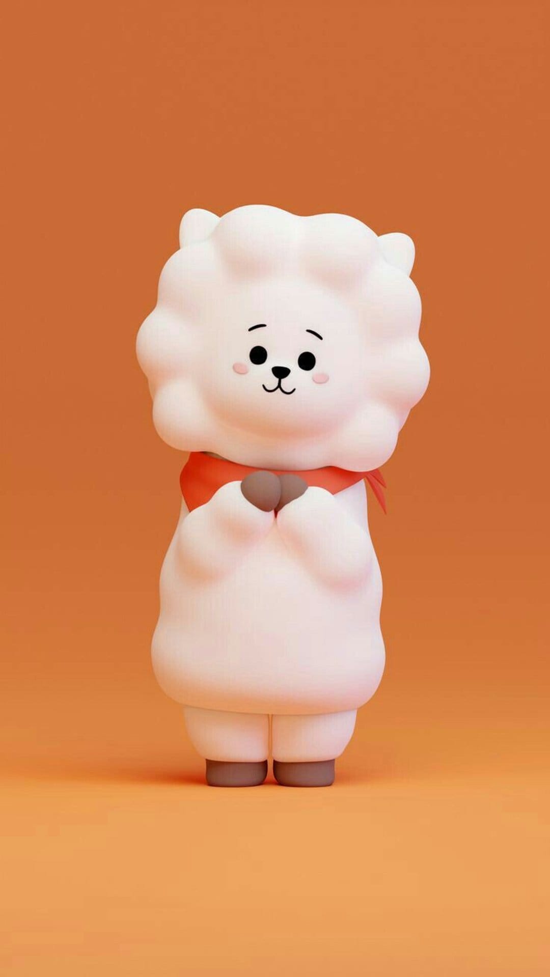 RJ the white alpaca makes a heart shape with his hands while wearing a red scarf on a bright orange background.