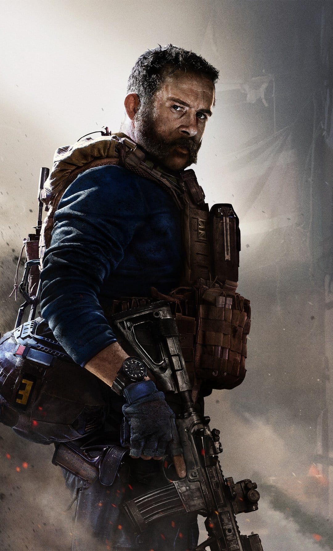 Bearded soldier in tactical gear holding an assault rifle amidst battlefield smoke and glowing embers.