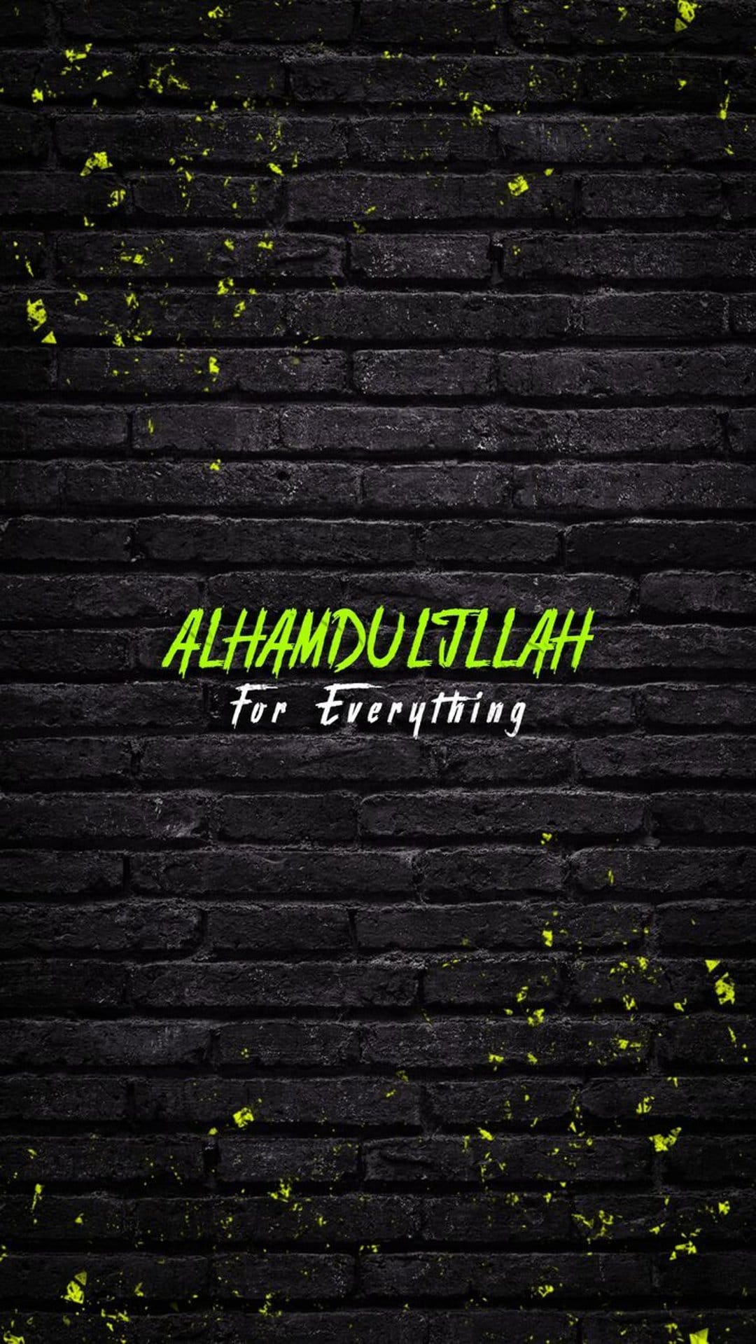 Green Alhamdulillah For Everything text centered on a dark weathered brick surface with mossy accents and texture.
