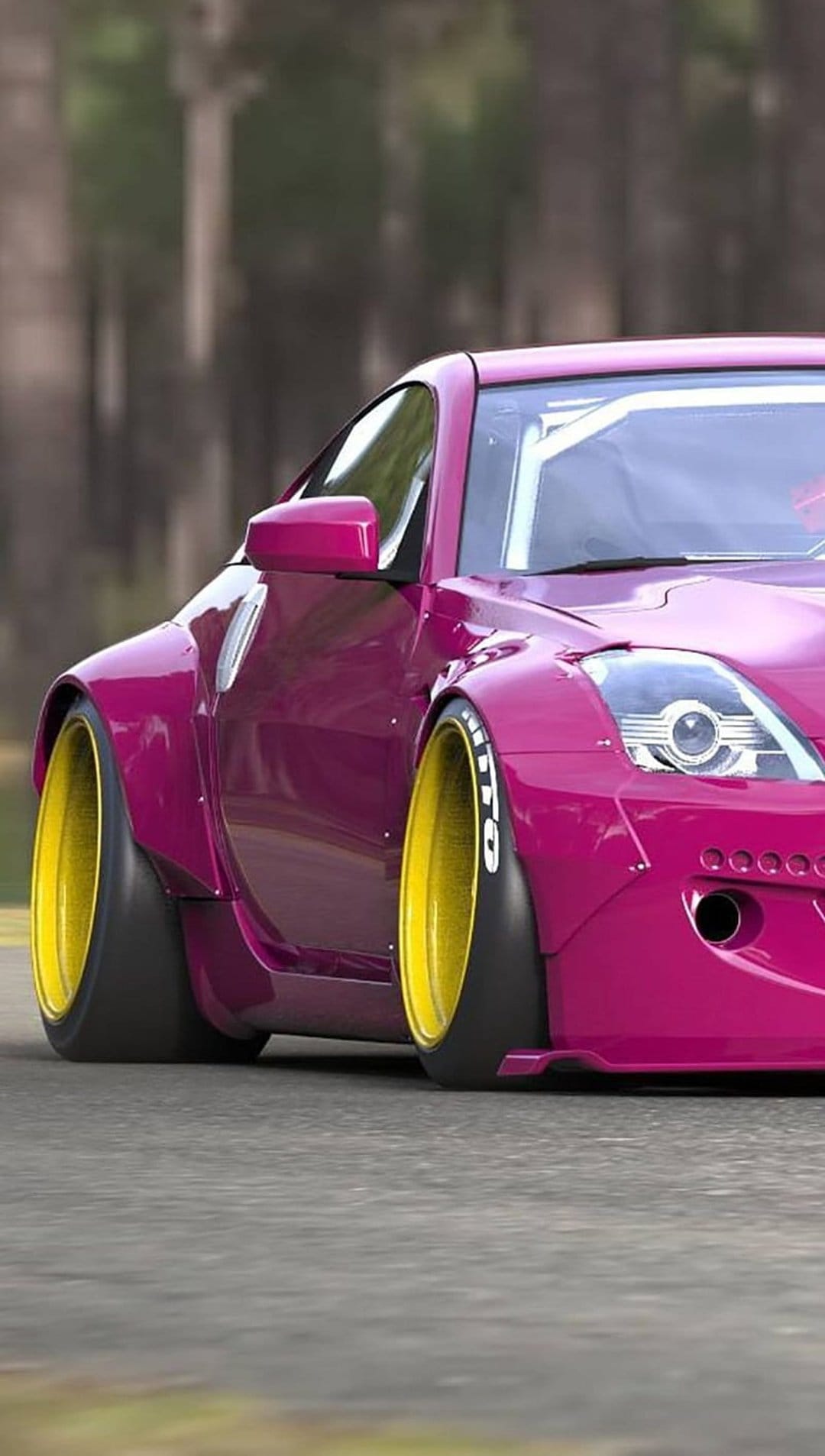 Nissan 350Z with pink widebody kit and yellow rims driving on a road with motion blur in the background.