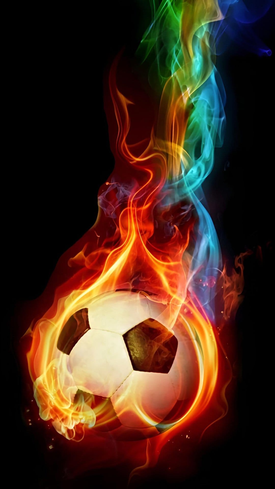 Soccer ball engulfed in orange fire and swirling rainbow smoke against a stark black vertical background.