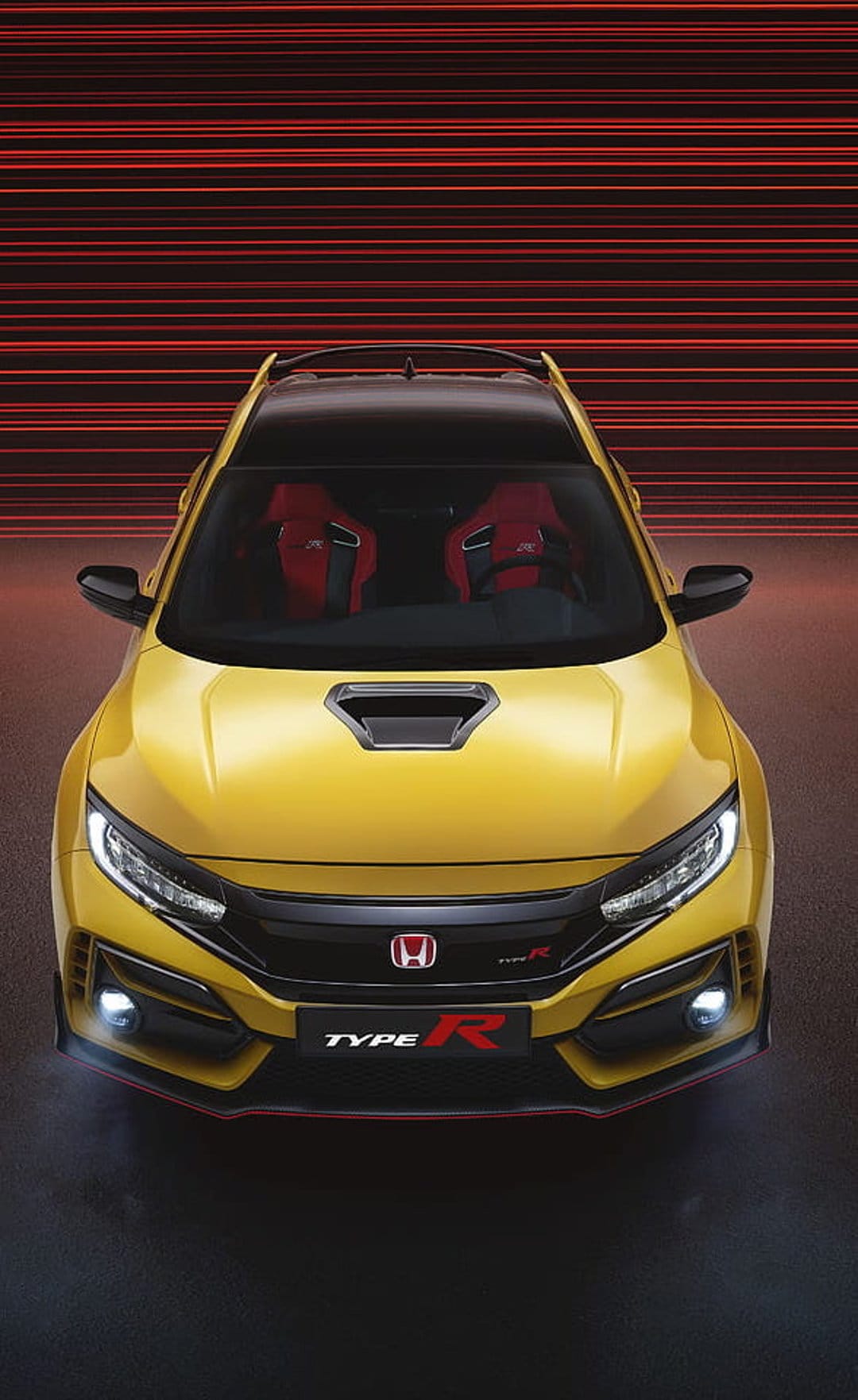 Yellow Honda Civic Type R featuring aggressive front grilles and red accents against a striped background.