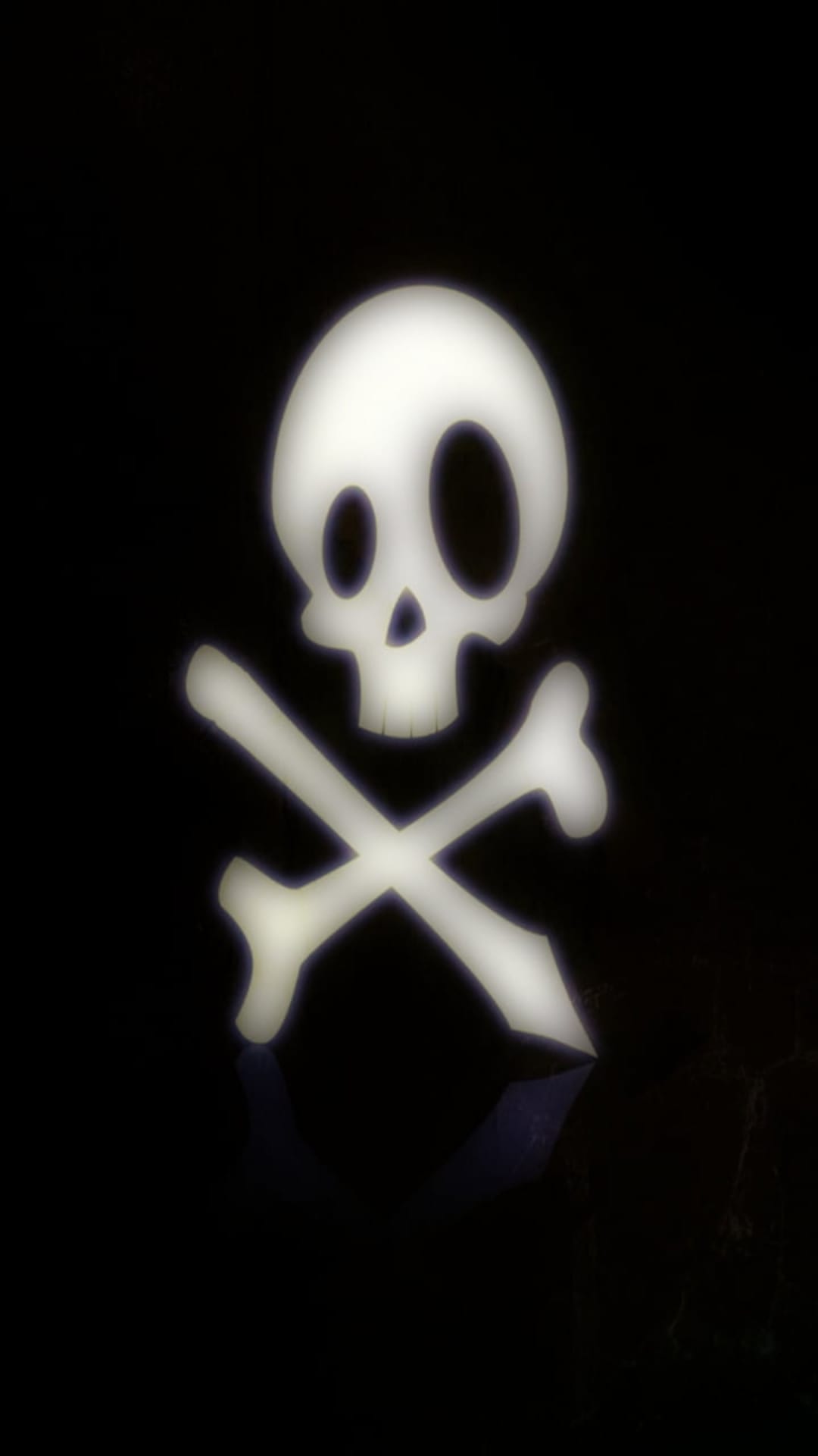 White glowing skull and crossed bones centered on a solid black background with a soft, ethereal light halo.