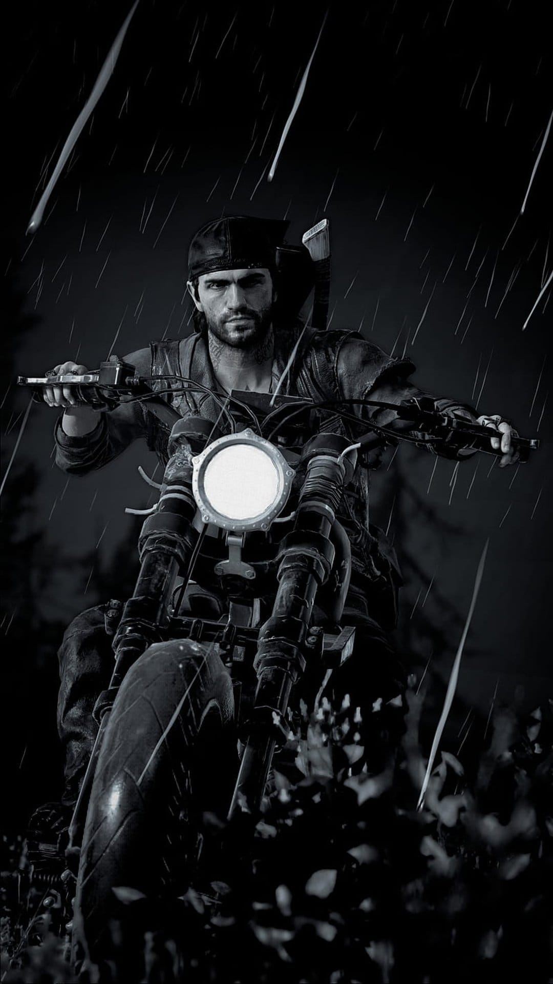 Deacon St. John rides a motorcycle through heavy rain while wearing a leather jacket with an axe on his back.